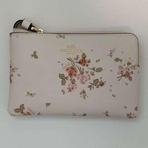Coach rose bouquet wristlet